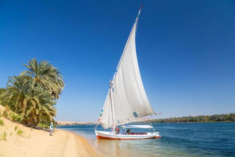 Travel: Felucca, traditional wooden sailboat on shore of Nile, Egypt.