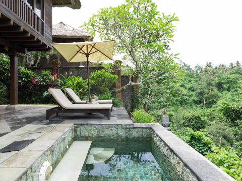 Architecture: Exterior view of villa in the lush countryside of Ubud, Bali in Indonesia.